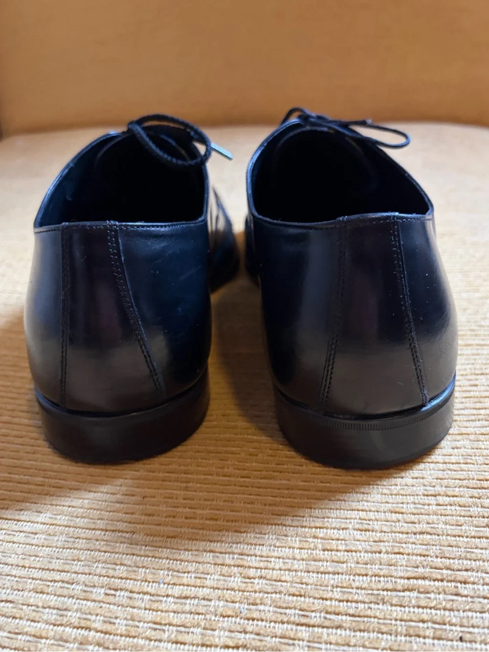 Salvatore Ferragamo black leather cap-toe oxford